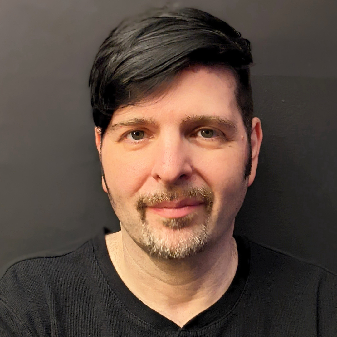 A portrait photograph of Andrew.